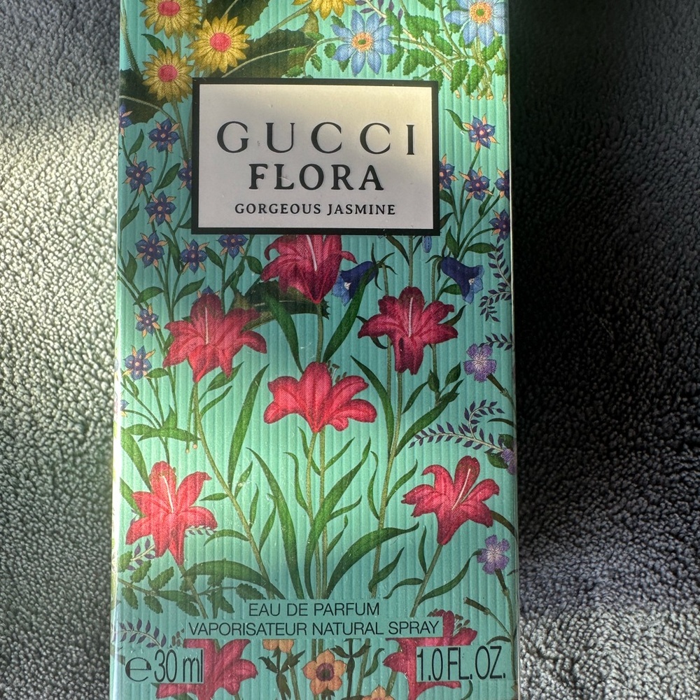 Gucci Flora Perfume with Gold Cap and Green Bottle